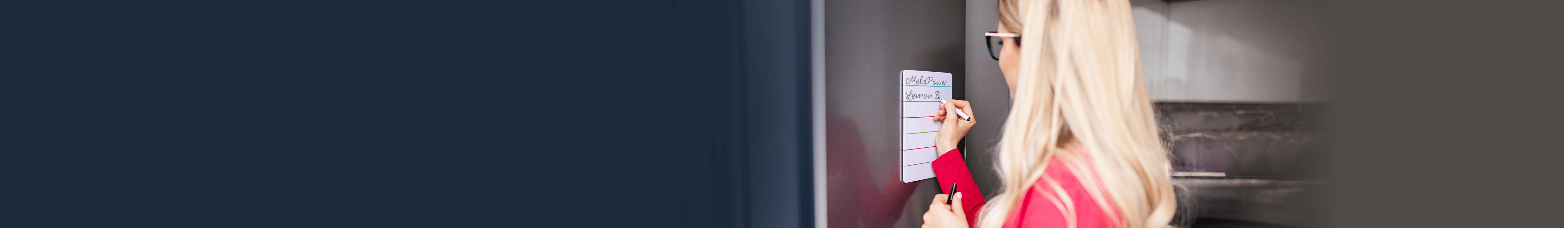 Woman writing on a notepad