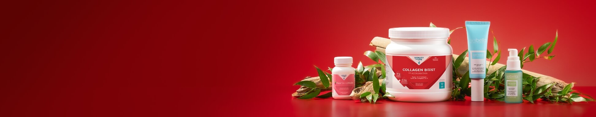 Shop Age Defense Collagen Bundle products lined up in front of leaves and wood on a red backdrop