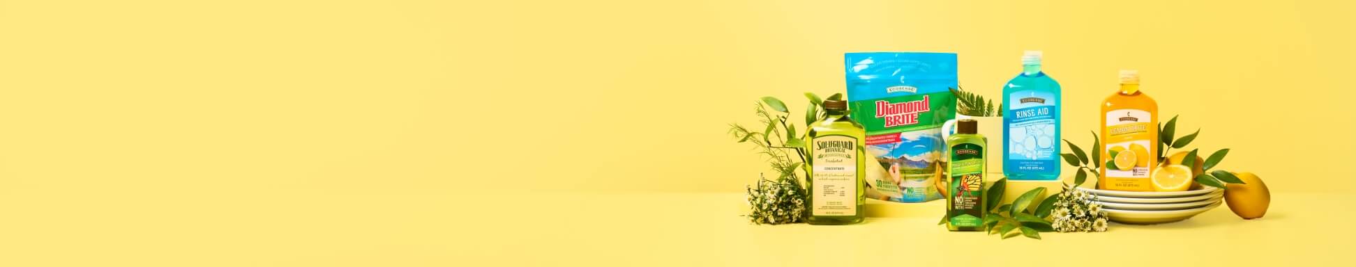EcoSense Kitchen Pack — an eco-friendly kitchen cleaning collection featuring plant-inspired products, fresh citrus accents, and reusable dishware against a bright, cheerful yellow backdrop.