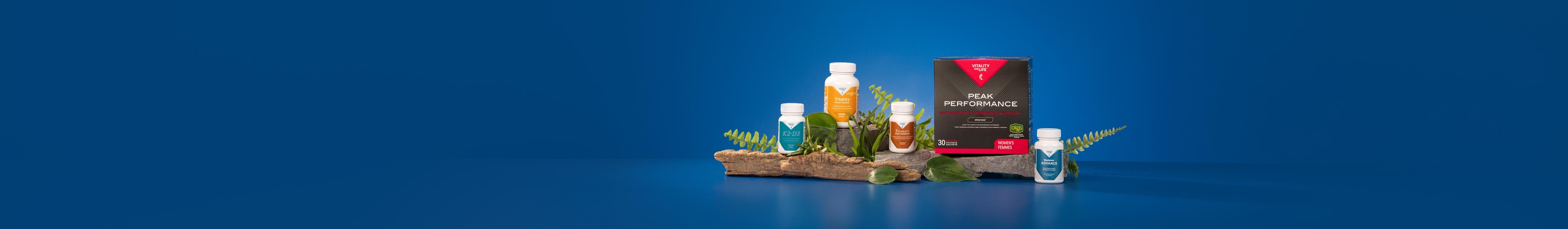 Peak Bone and Joint health bundle surrounded by nature items against a blue background