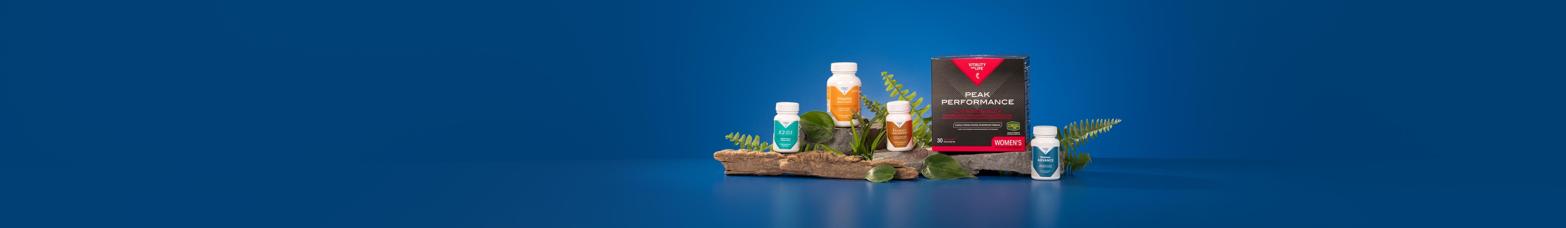 Peak Bone and Joint health bundle surrounded by nature items against a blue background