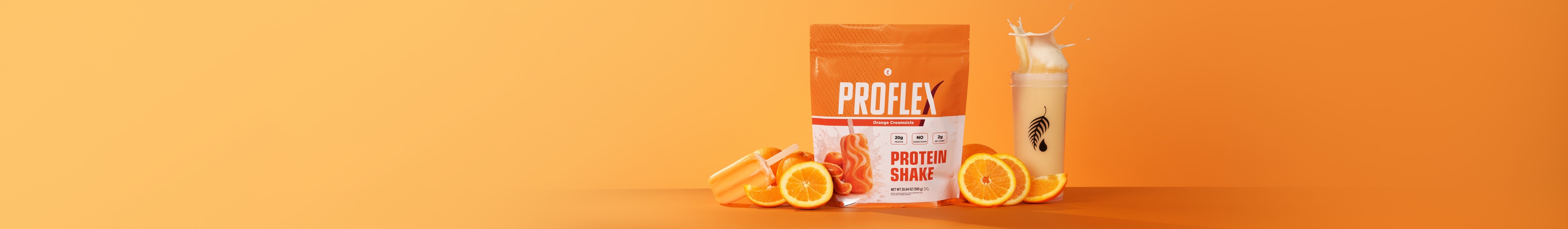 A bag of 'Orange Creamsicle' Proflex, surrounded by an actual frozen orange creamsicle, some fresh orange slices and an overflowing Blender Bottle.